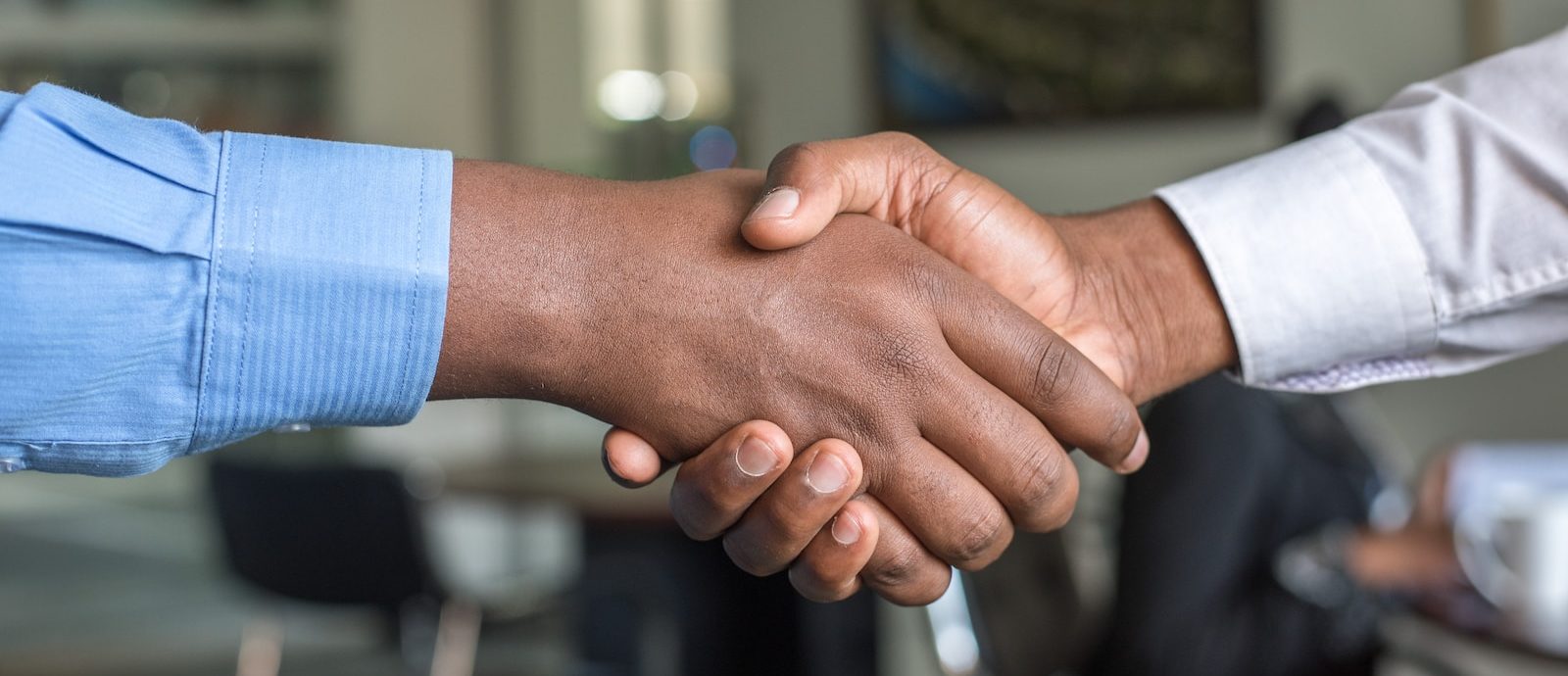 two people shaking hands